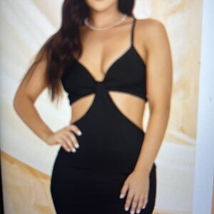 Bebe cut out 3/4 dress, large. BNWT.